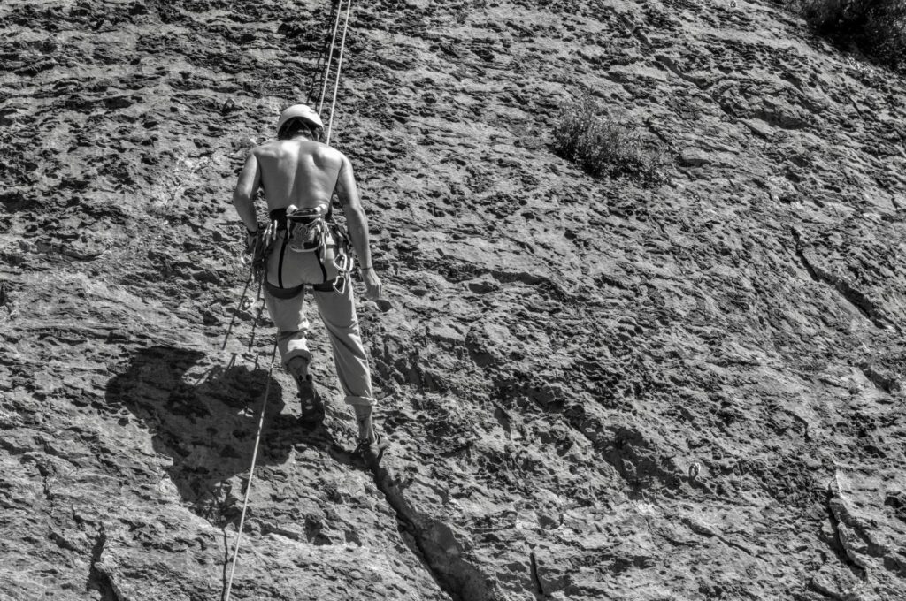 Boy climbing in the Central Pyrenees